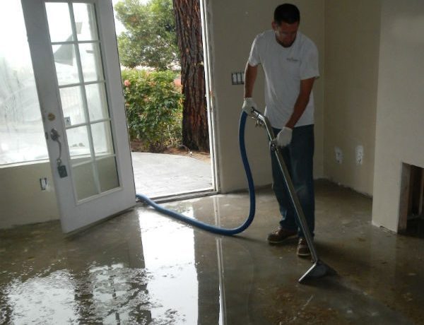 Water extraction from a flooded floor during water damage cleanup